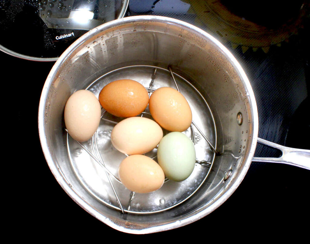 steamed hard boiled eggs pot of eggs steaming