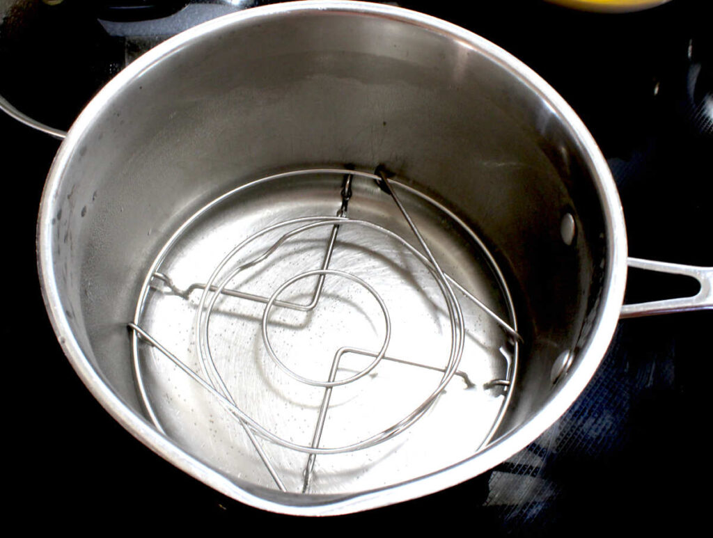pot with trivet for steaming eggs