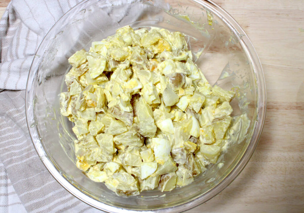American Potato salad recipe mixed in a bowl