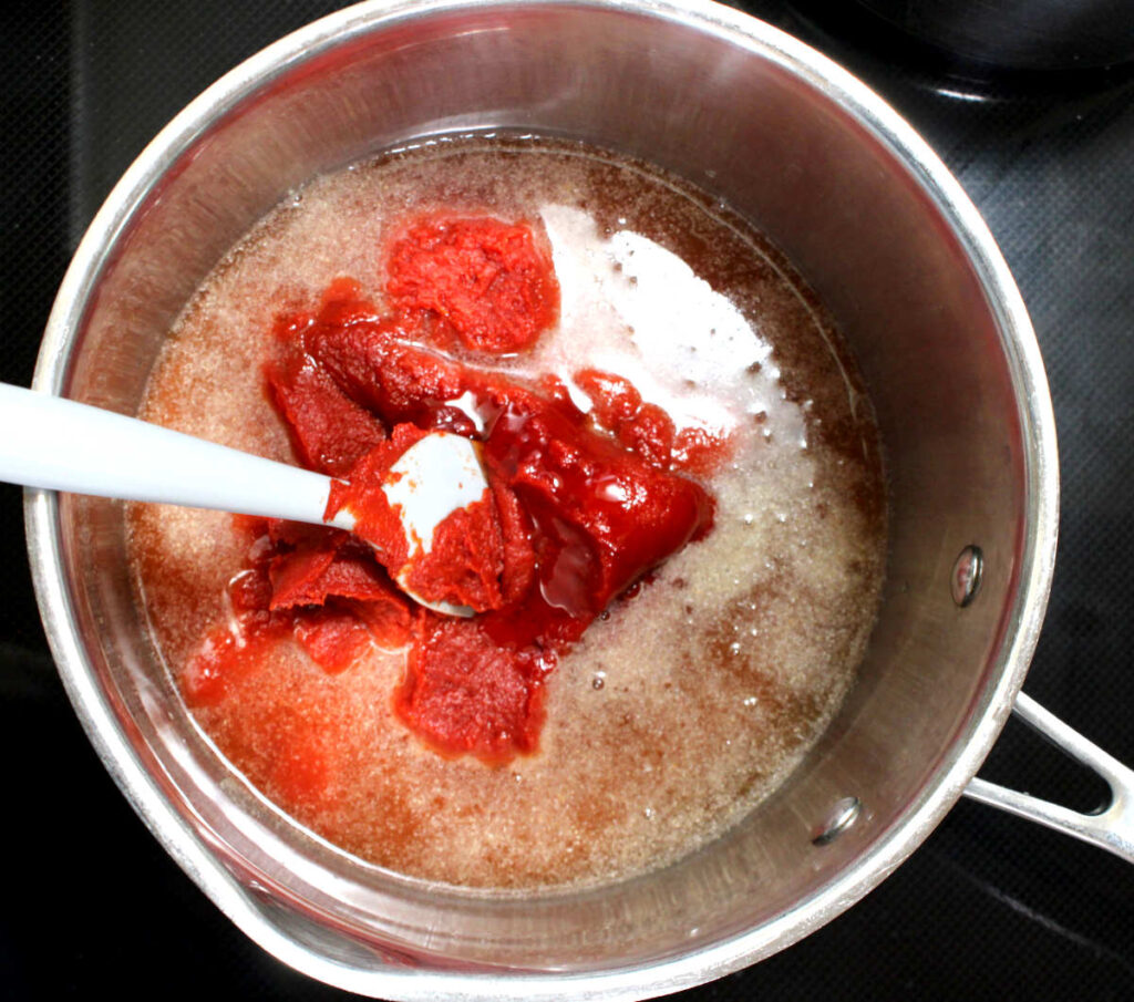 cooking the ingredients to make sugar free ketchup